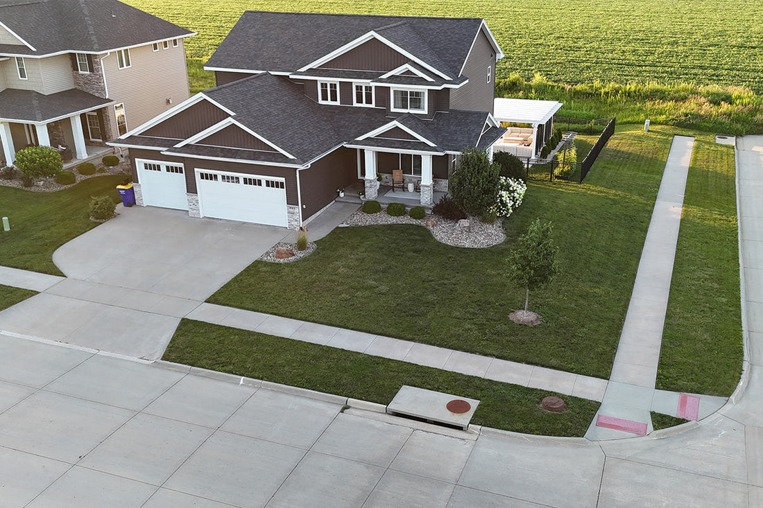 Adam’s home lawn and landscaping viewed from above, where Living Rain has been applied
